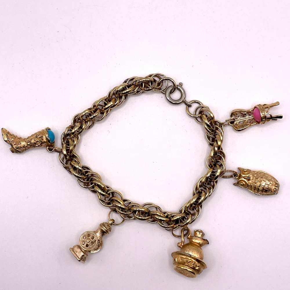 Avon Signed Vintage Gold Tone Five Charm Bracelet